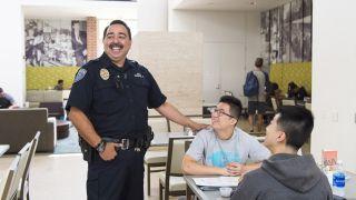 a public safety office talks to students